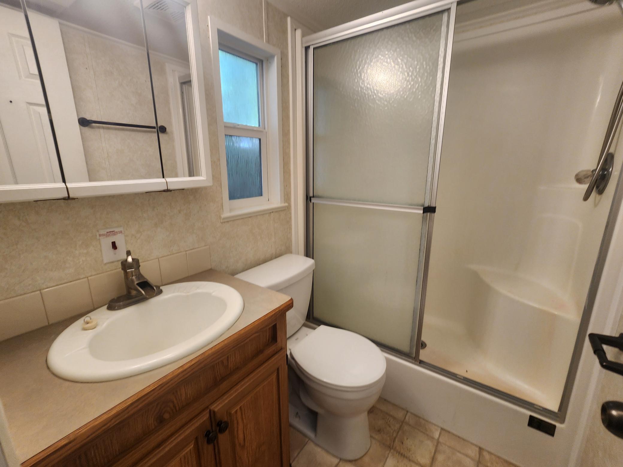 Cokato Lake RV Resort Unit 118 Lofted Park Model, Deck, Shed with peek-a-boo view of Cokato Lake