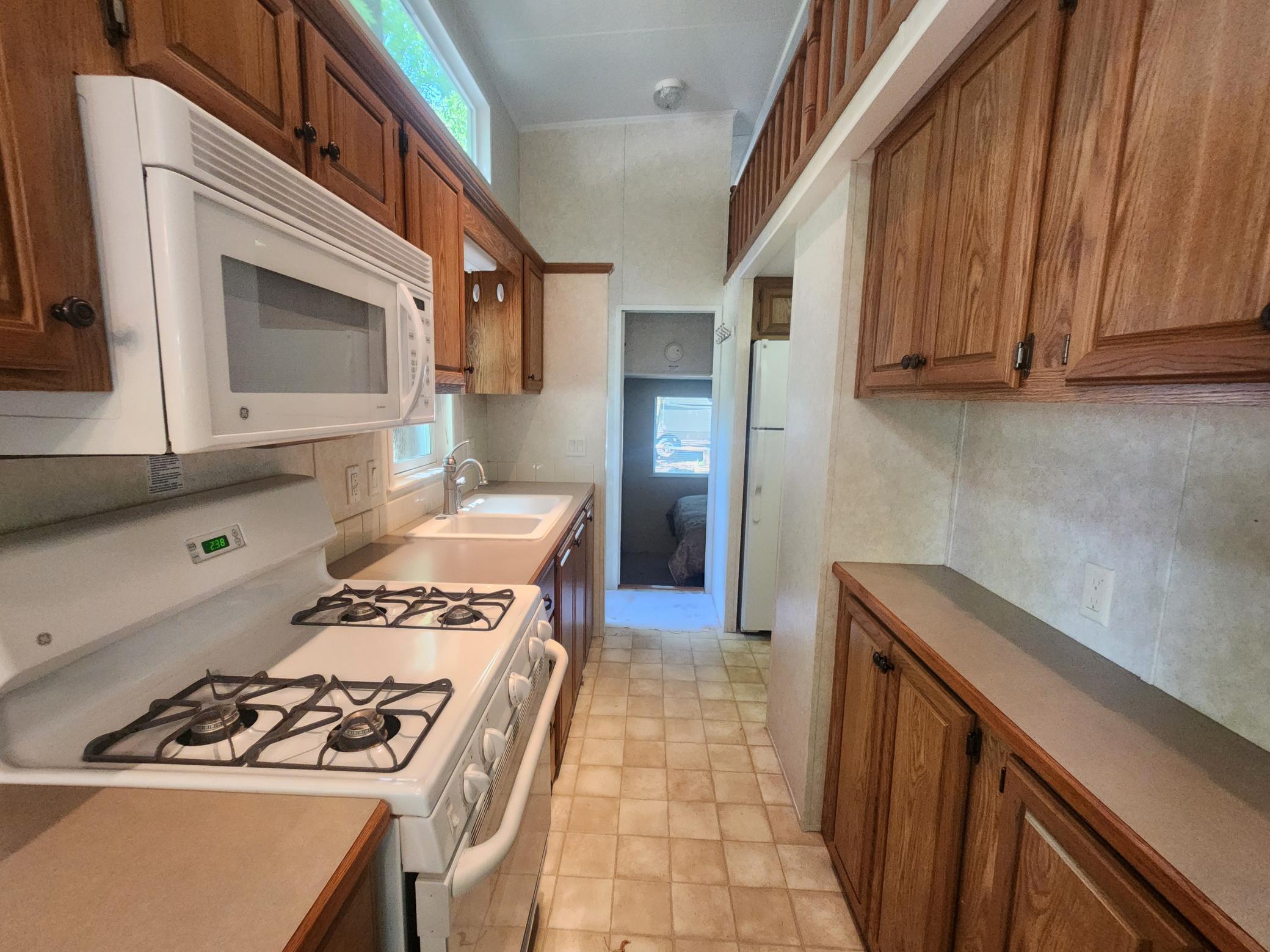 Cokato Lake RV Resort Unit 118 Lofted Park Model, Deck, Shed with peek-a-boo view of Cokato Lake