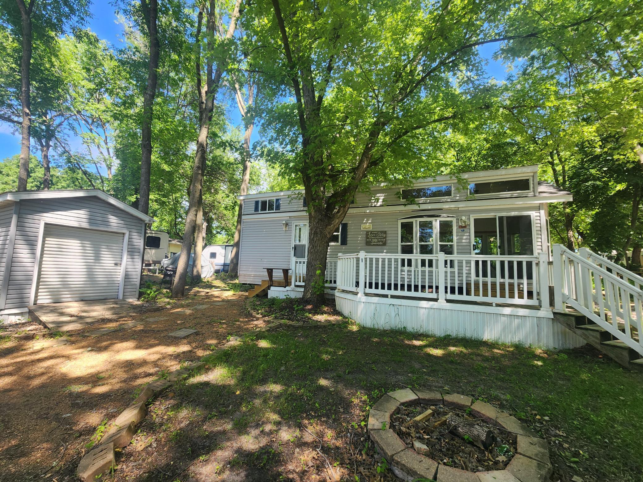 Cokato Lake RV Resort Unit 118 Lofted Park Model, Deck, Shed with peek-a-boo view of Cokato Lake