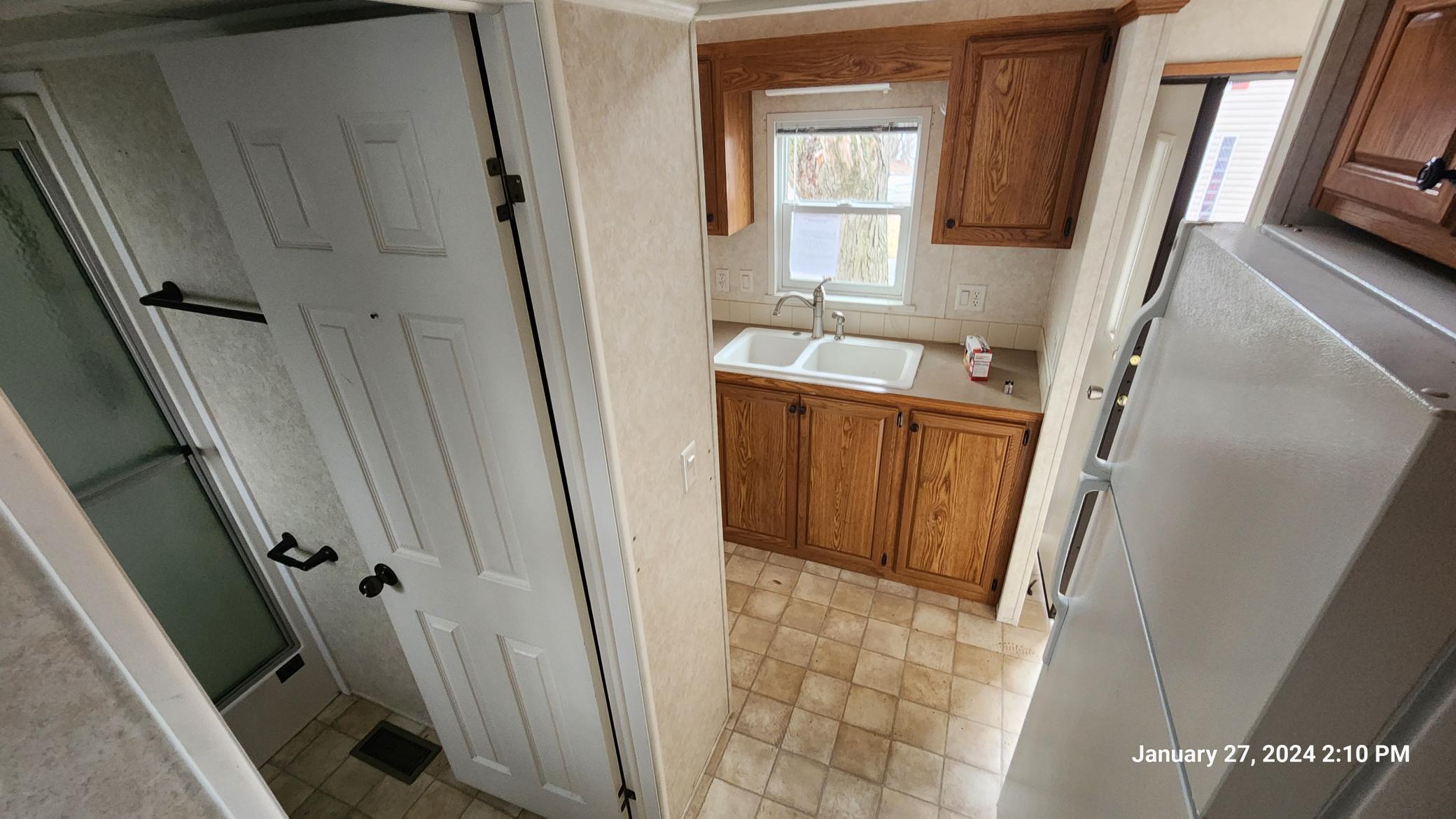 Cokato Lake RV Resort Unit 118 Lofted Park Model, Deck, Shed with peek-a-boo view of Cokato Lake