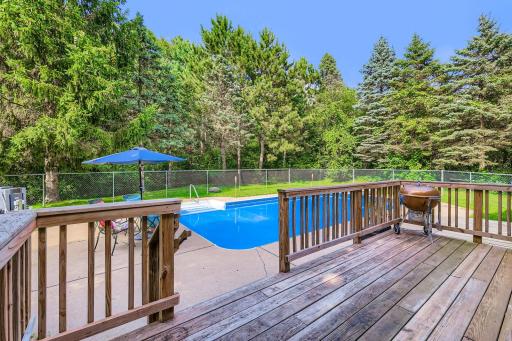 Deck off the dining room overlooking a very private pool setting
