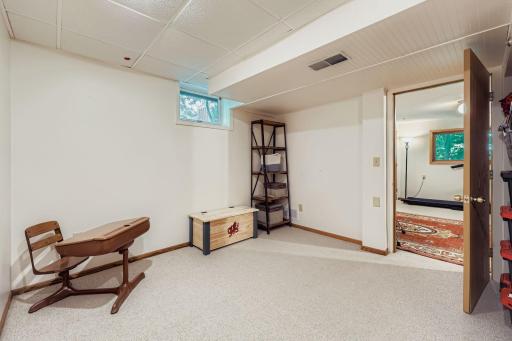 Lower-level office. Add an egress window for a 4th legal bedroom