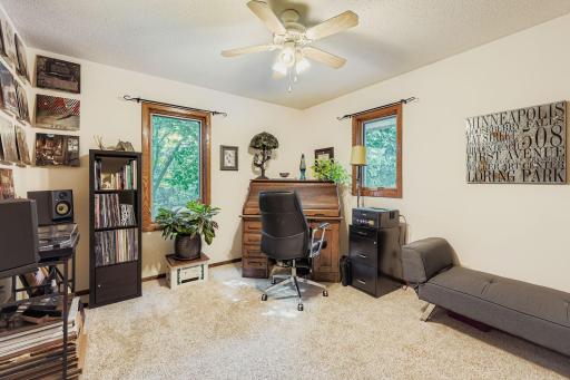 Upper-level bedroom is being used as an office