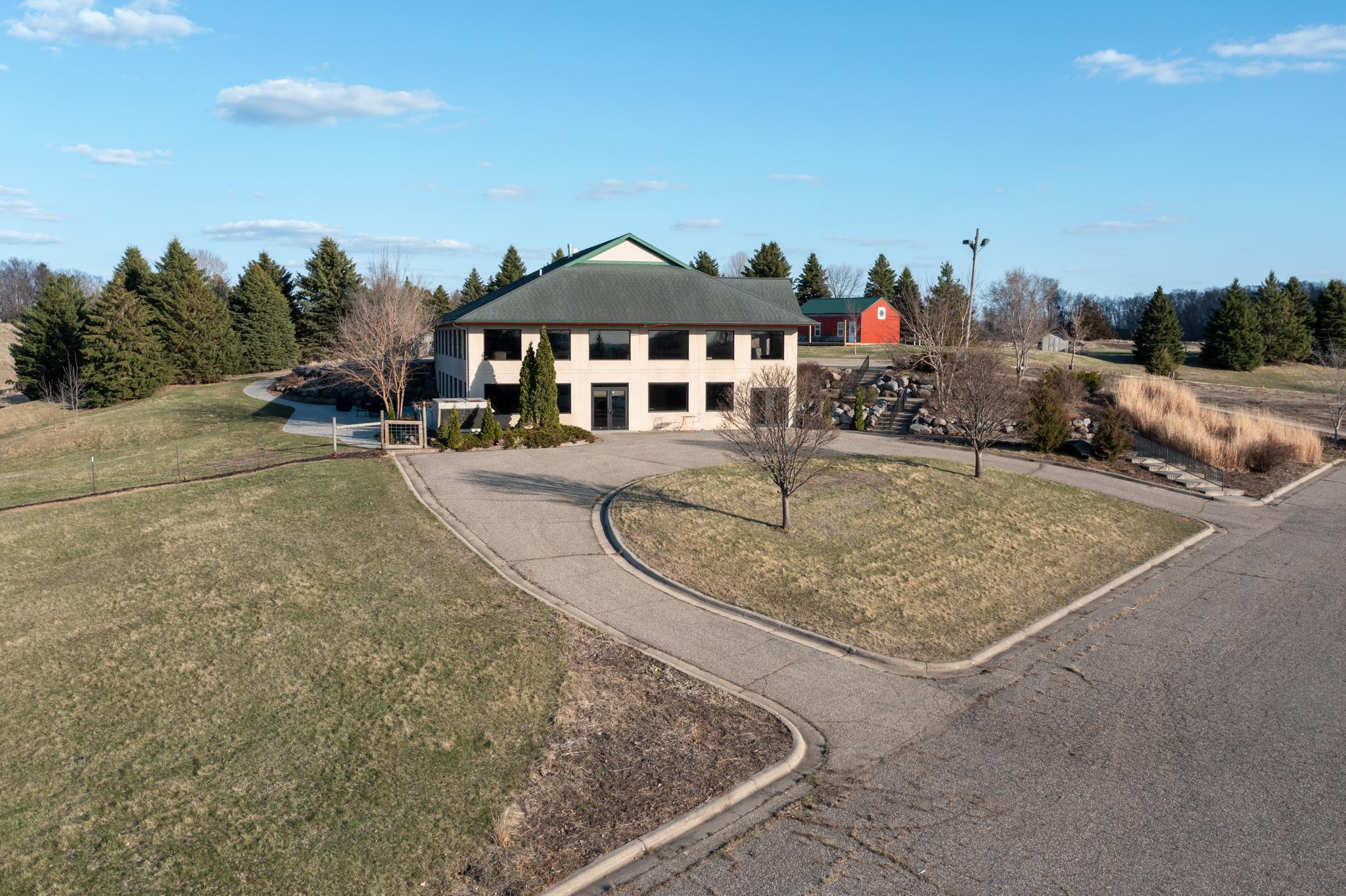 Horseshoe driveway for easy access to the lower level, especially for hosting events.
