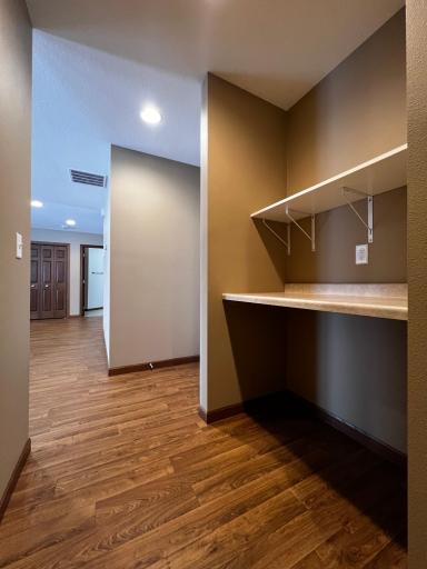 View looking out of the Laundry Room into the hall and main living area.