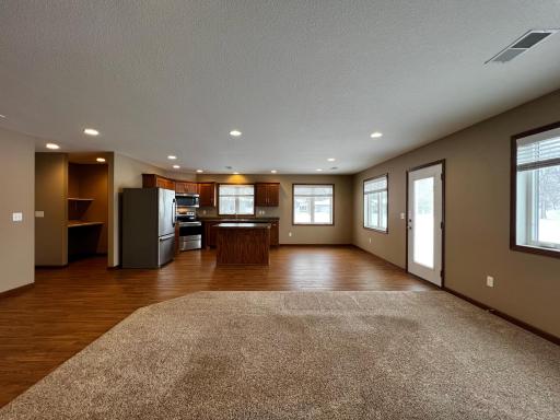 View of Laundry Room, Kitchen, Dining Room & Living Room.