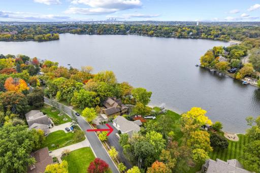Lake Johanna property on a stunning .74-acre lot. Why drive to the lake? Fish, boat, waterski, kayak, & relax by the lakeside firepit right in your backyard! In town convenience w/ an up north vibe. Minutes to downtown with skyline in the backdrop.