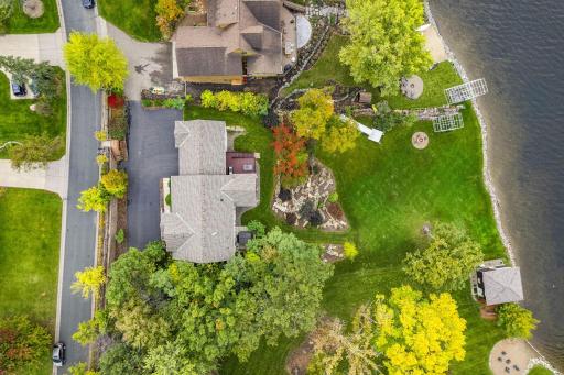 Enjoy the best of all worlds with this home perched at the highest point of the land to take advantage of the sweeping western views, great privacy, open space, and an amazing, expansive yard.