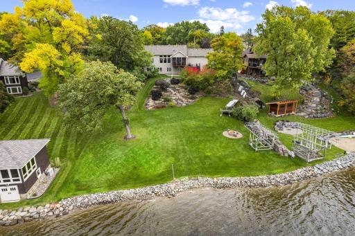 Best of both worlds! A spacious, flat yard by the water with 109 feet of accessible shoreline and a gentle slope leading to a home perched at the highest point, perfectly positioned to soak in the panoramic views, makes this the ideal lake lot!