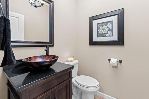 Main floor powder bath situated just off the mudroom, offering convenient access while maintaining proper separation from the main living area.