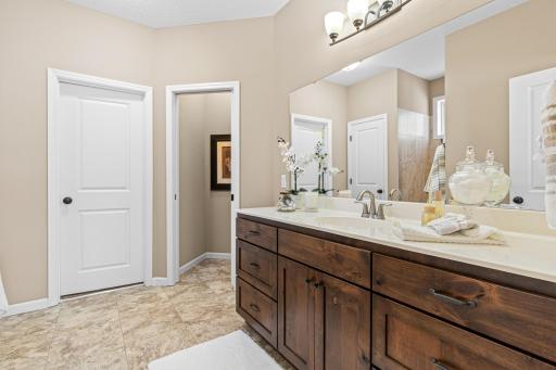 Second view of the ownerâs suite bath. The closed door lead to the walk in closet. See floor plan within the photos.