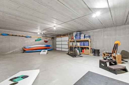 The 792 sq. ft. âMan Caveâ beneath the main level garage is accessible from the finished lower level & currently serves as a workout/game room, storage for lake toys, & features 8'4" ceilings. It could be finished into additional livable space.