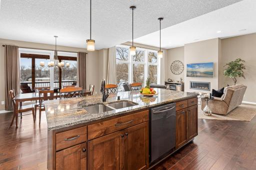 The center island and breakfast bar make entertaining a breeze, with an open layout thatâs perfect for hosting gatherings.