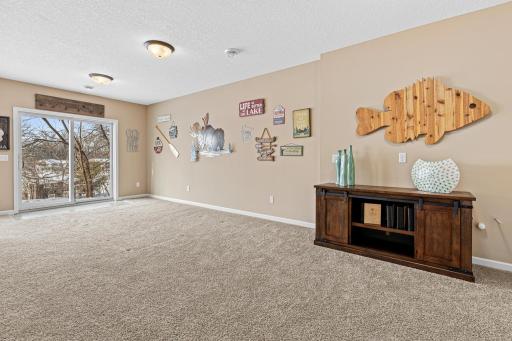 This section of the huge family room is ideal for a game table, dinette, or pool table, offering plenty of room for entertaining. Itâs also perfectly suited for comfortable multi-generational living.