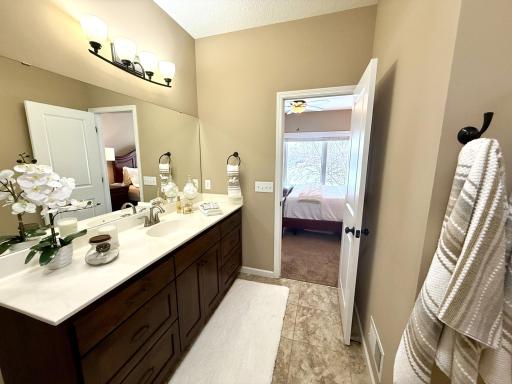 Owners suite bath has a walk in shower and separate water room.