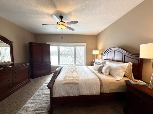 Owner's suite features an en-suite bath with a large walk-in closet ideally situated of the bathroom for quiet when one person is up earlier than the other.