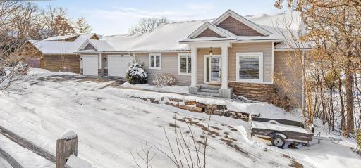 One-story home carefully designed to offer lake views from nearly every room in the house.