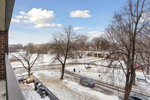 Enjoy views of the lake and mall area from the balcony.