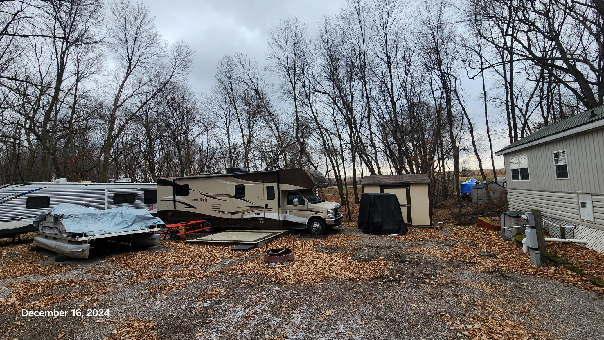 Unit 411 at Cokato Lake RV Resort is a perfect location in the center of the park and NO MOWING REQUIRED as this unit is currently all gravel surface for ease of placement of RV(s). Includes a shed and firepit and abuts "creek" in back.