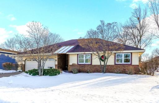 Well-maintained one-owner Rambler with inviting curb appeal and a Covered Front Entry.