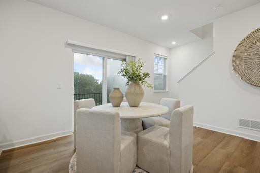 (Photo is of a model home, finishes will vary) The dining area is located right by the kitchen and Great Room