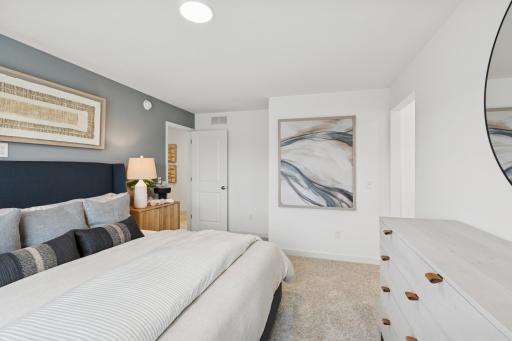 (Photo is of a model home, finishes will vary) Another angle of the Owners Suite.