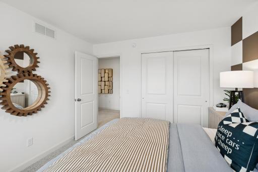 (Photo is of a model home, finishes will vary) Another angle of a secondary bedroom.