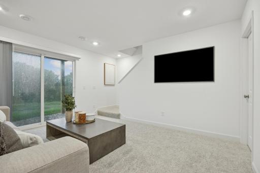 (Photo is of a model home, finishes will vary) This home features a finished basement!