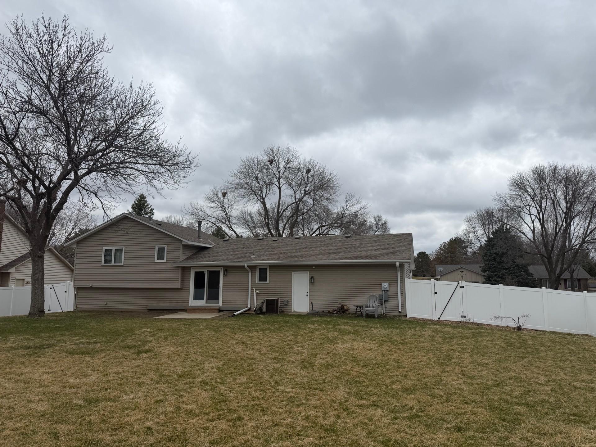 Big, flat, maintenance-free privacy-fenced corner lot!