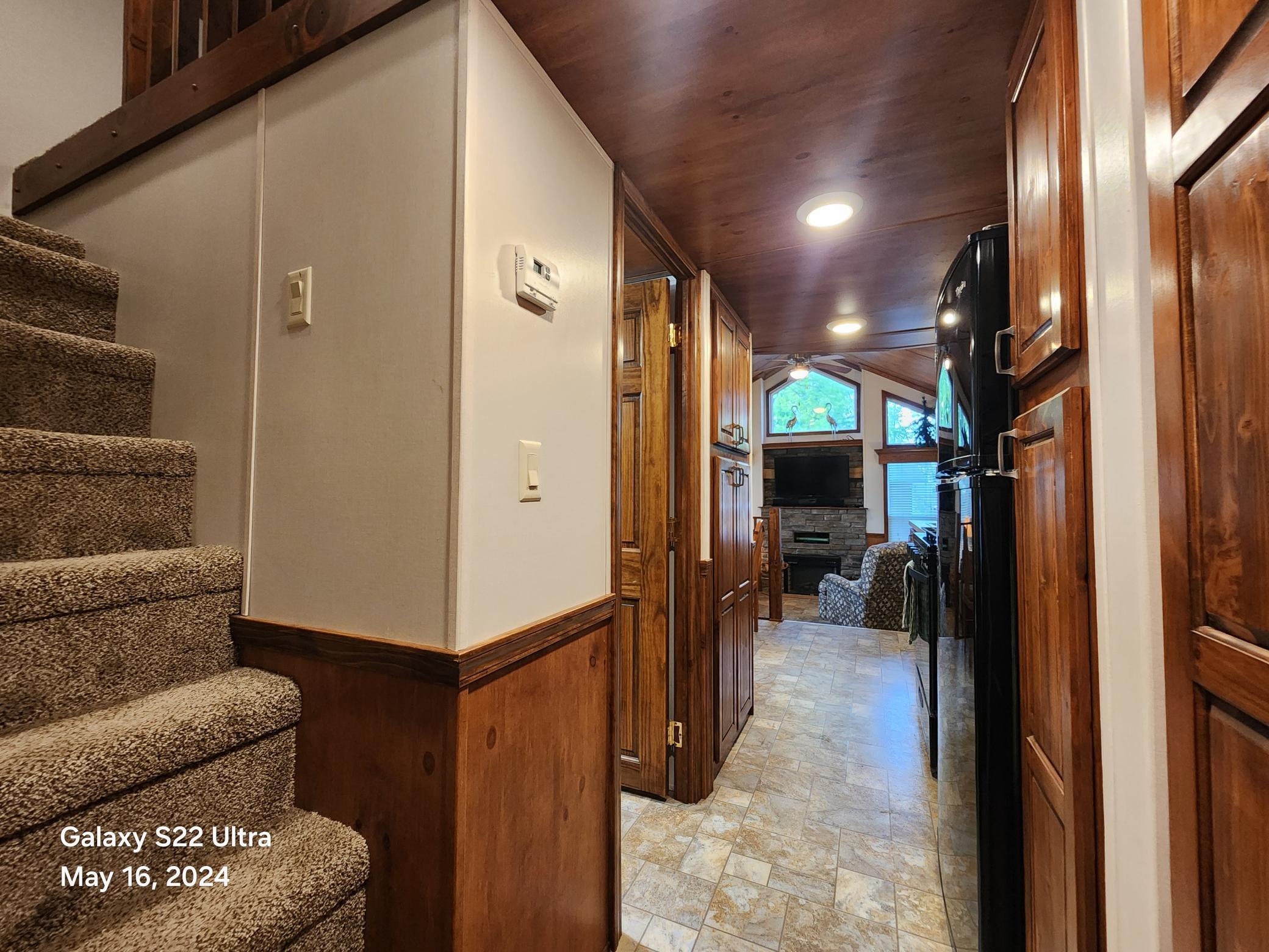 View from bedroom looking down hall to main living area