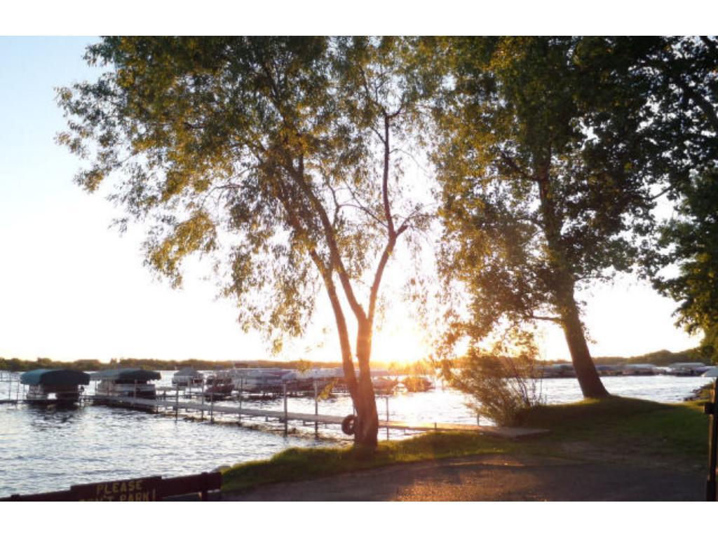 Unit 159 Cokato Lake RV Resort Cooperative Association has gravel pad, deck, paver area, shed and another driveway - all waiting for you!