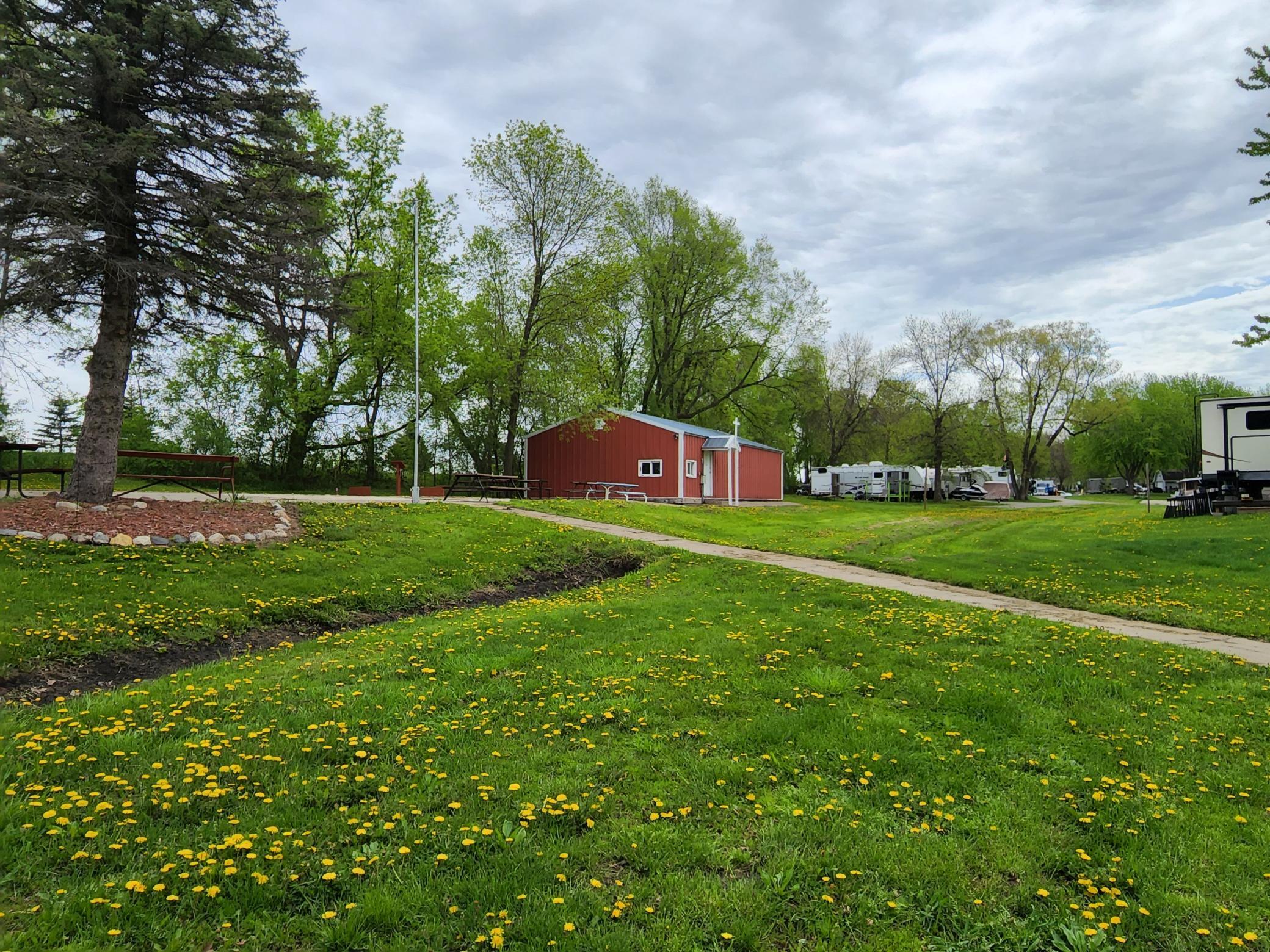 Unit 144 at Cokato Lake RV Resort Cooperative Association - great level lot with lots of space, lake view. Own and use it, or rent it out! Great level lot.