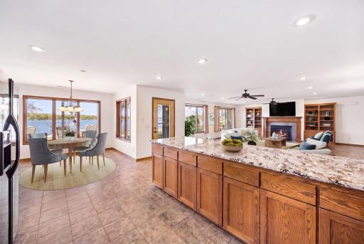 Lower level kitchen/wetbar steps away from the lake for entertaining. Virtually staged.
