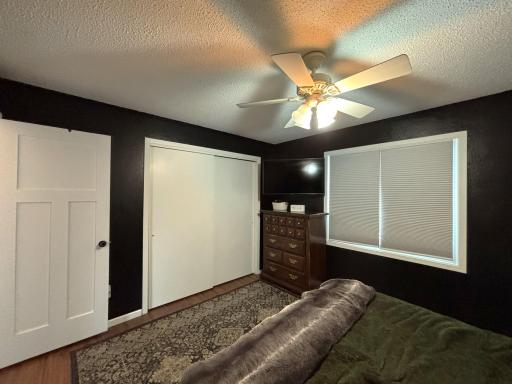 Primary bedroom has double closets with closet organizer.