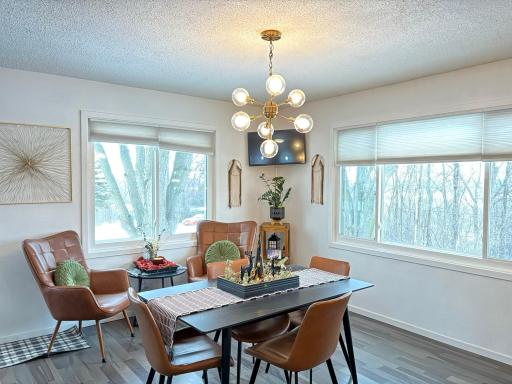 Main floor living room or dining room - you choose how to use the space.