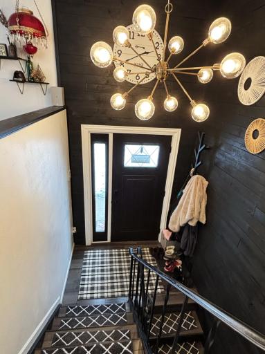 Main floor entrance w/accent wall and new lighting