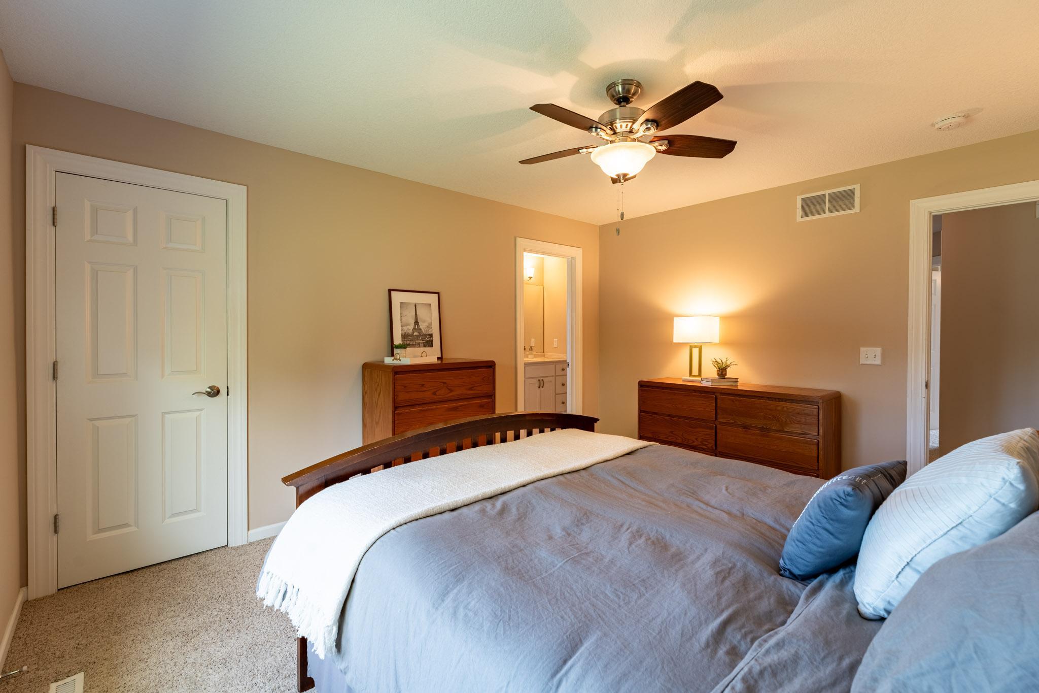 Owner's suite with walk-in closet and private 3/4 bath.