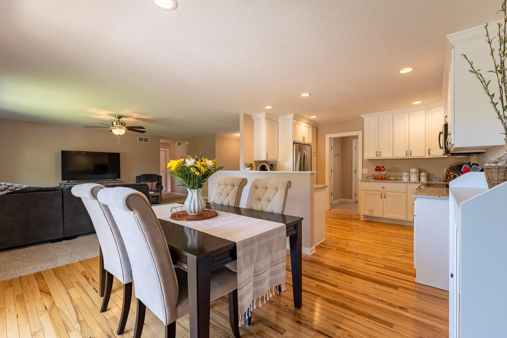 Hickory hardwood floors in the kitchen and dining area.
