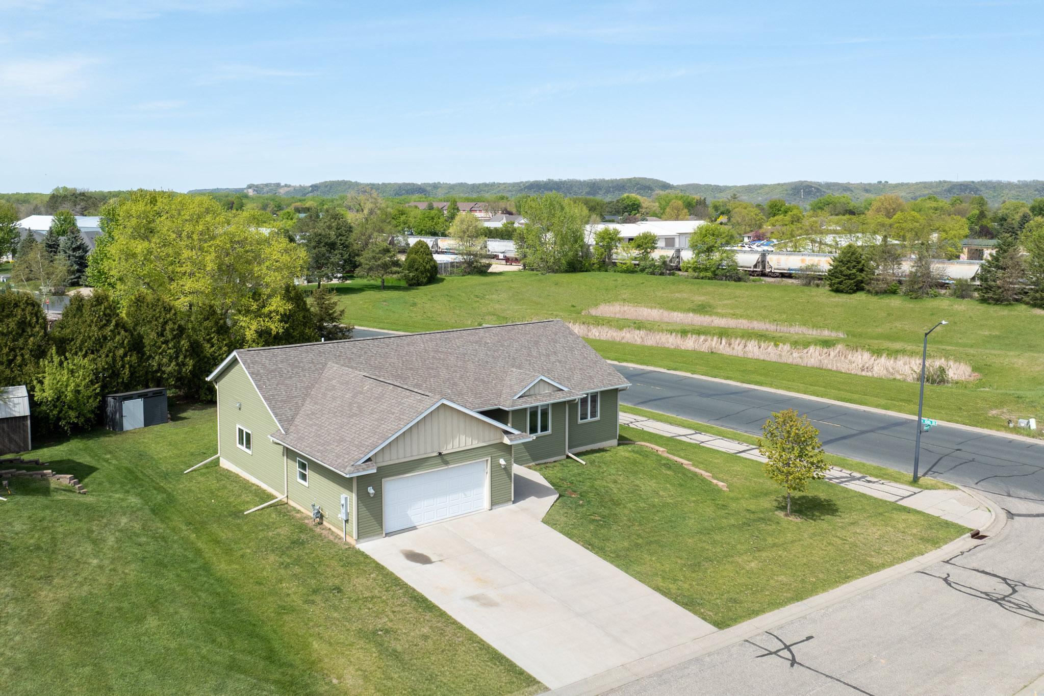 The oversized garage includes a tandem stall—ideal for boat or trailer storage, a workshop, or a third vehicle.