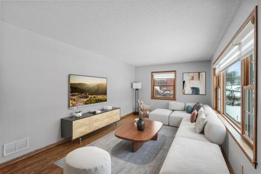 New paint, gleaming hardwood floors, new windows and so much more! Nothing left to do here. (Virtually staged)