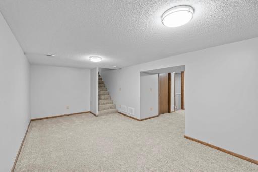 Finished basement with lots of great spaces. New carpet, paint, doors. Totally remodeled for easy move in to make it yours.