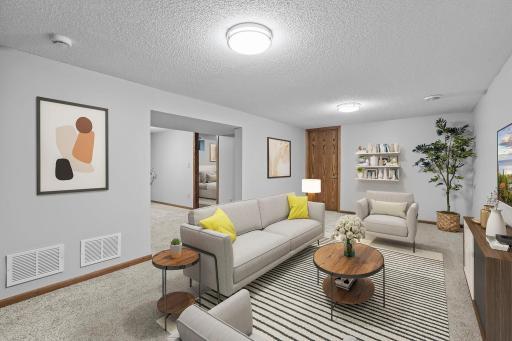 Finished basement with lots of great spaces. New carpet, paint, doors. Totally remodeled for easy move in to make it yours. (virtually staged)