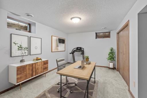 Office / Flex Room in basement. Virtually staged to imagine the possibilities.