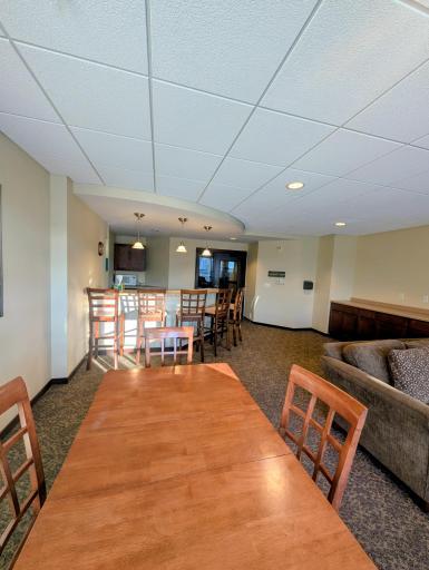 Beautifully maintained shared space offering flexibility for entertaining and social events.