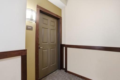 Inviting, end unit entryway that welcomes you home with a clean, well-maintained first impression.