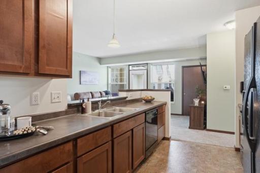 Another view of the kitchen showcasing its thoughtful layout and connection to the main living space.