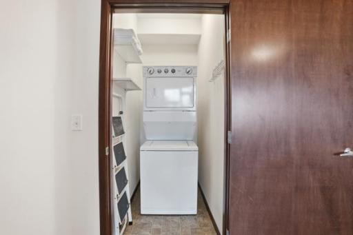 Convenient in-unit laundry closet designed for everyday ease and efficient use of space.