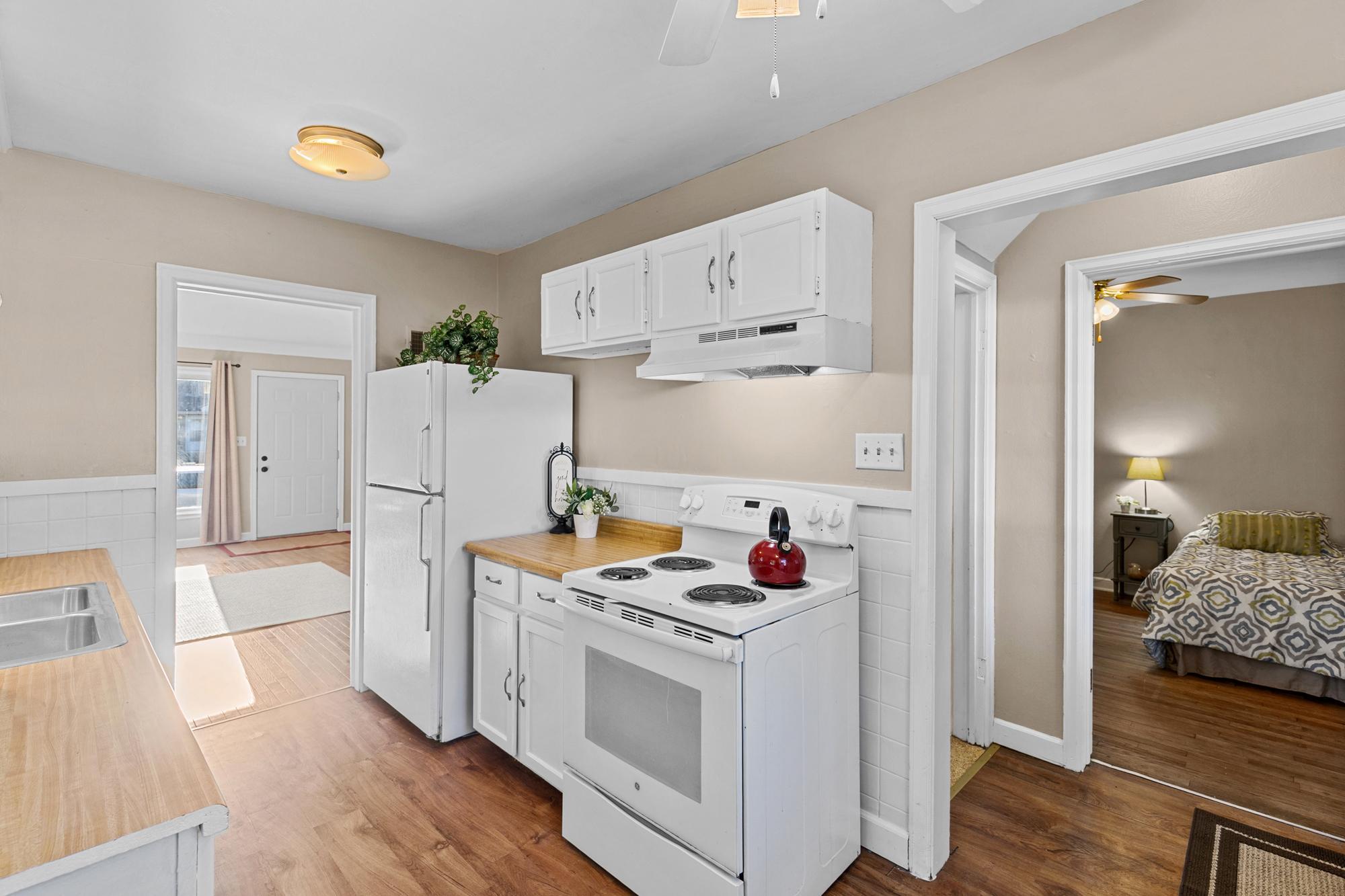 The refrigerator, range, range hood, washer & dryer and water softener will all stay