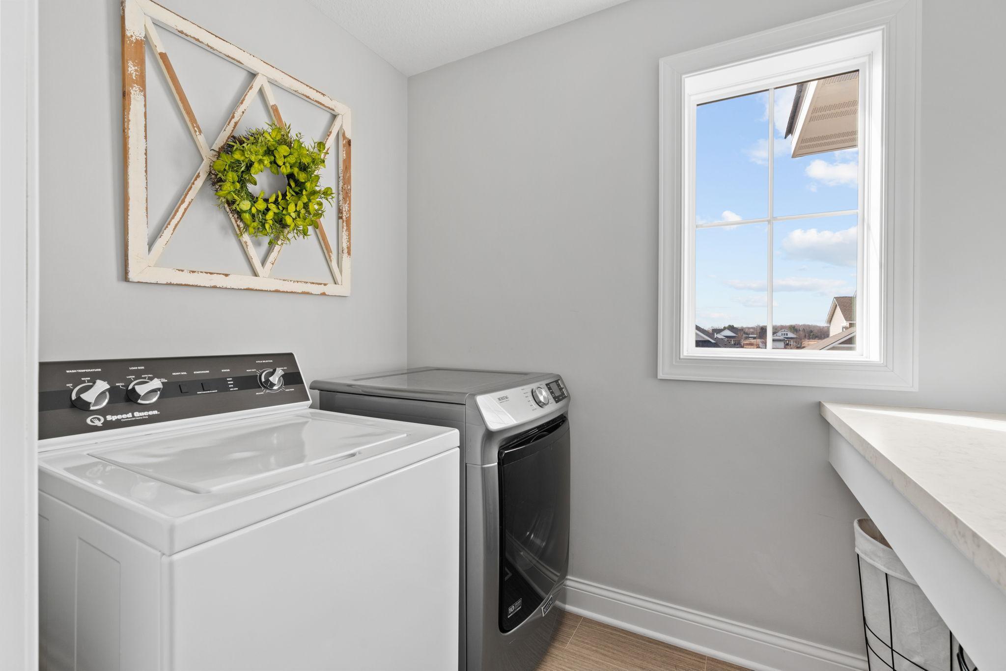 Upper-level laundry for ultimate convenience.