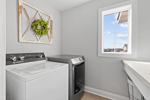 Upper-level laundry for ultimate convenience.